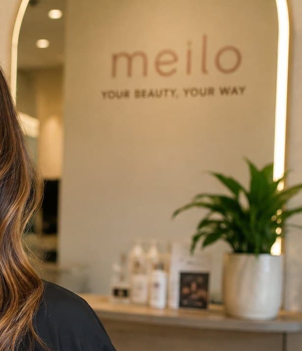 A Meilo salon reception, with a fresh balayage in the foreground