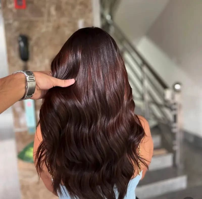Rich Chocolate Cherry Hair Color with Glossy Soft Waves